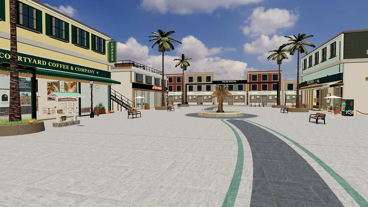 The town plaza in Palm Social, lined with cafés, shops and palm trees